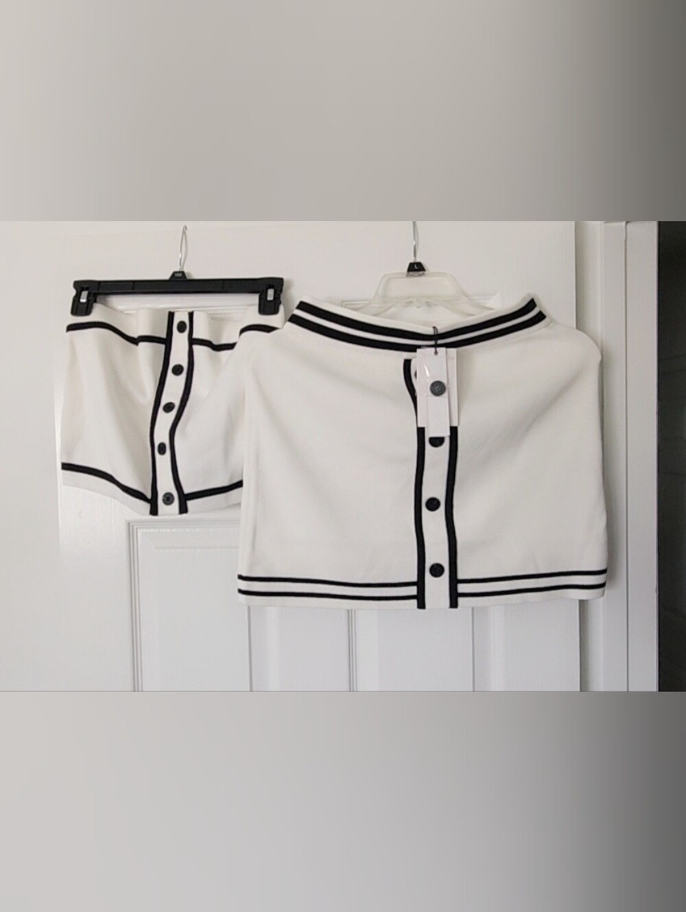 REVOLVE White Mini Skirt with Black Trim and Button Front